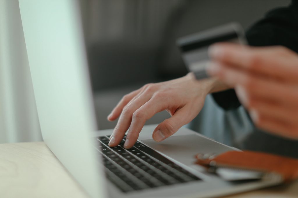 female accountant typing on a laptop