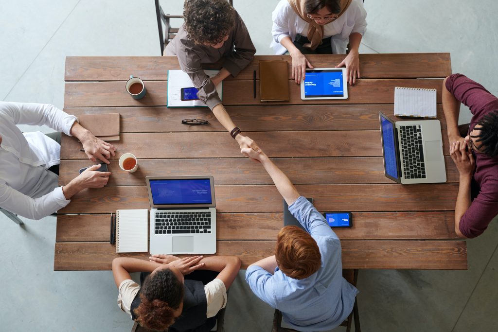 top view shot of a group of accountants having a meeting