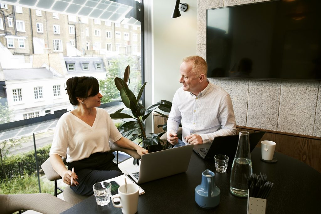 accountant having a discussion with her client