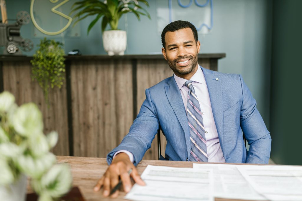 smiling accountant having a meeting with his client