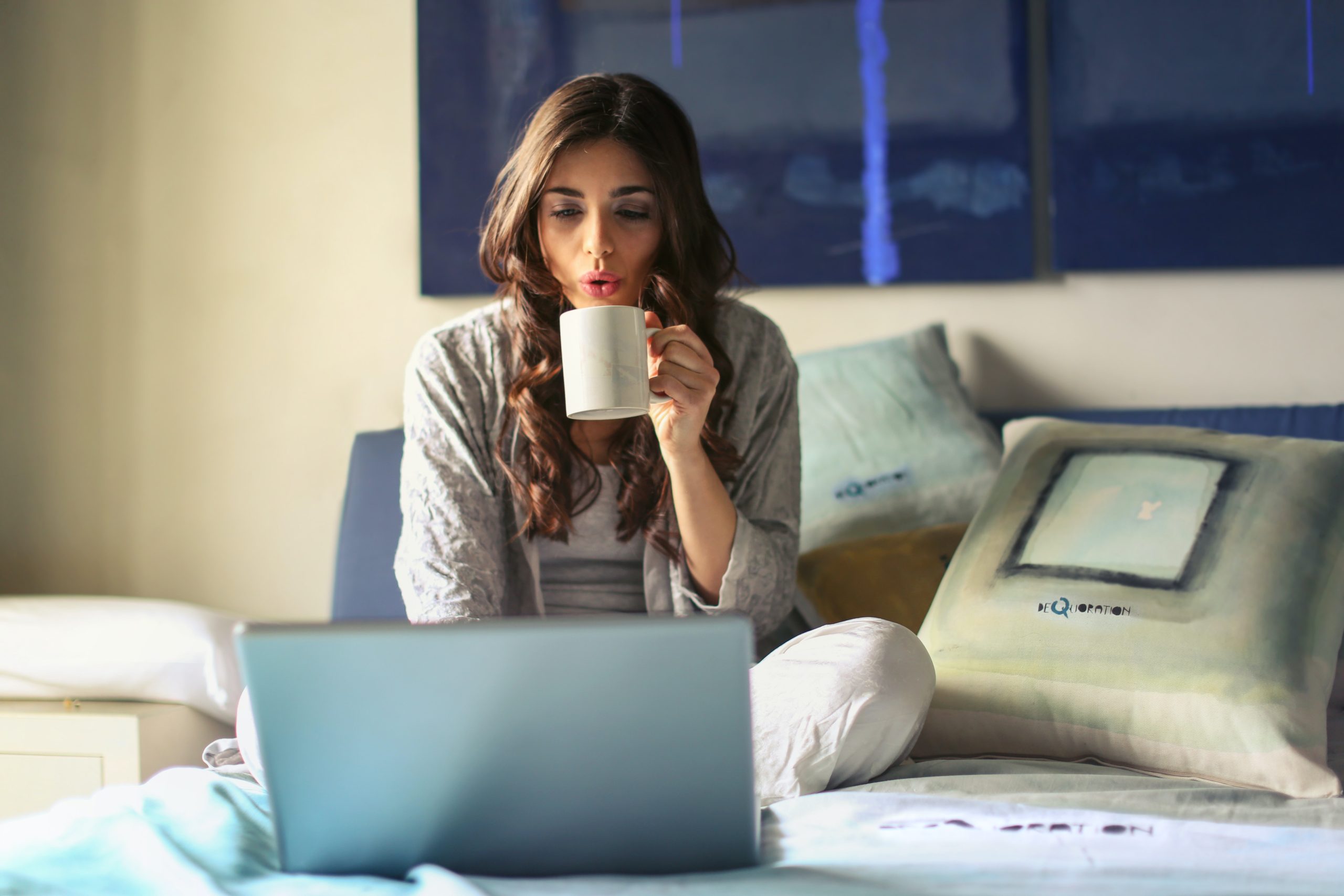 accountant working from home while having a coffee