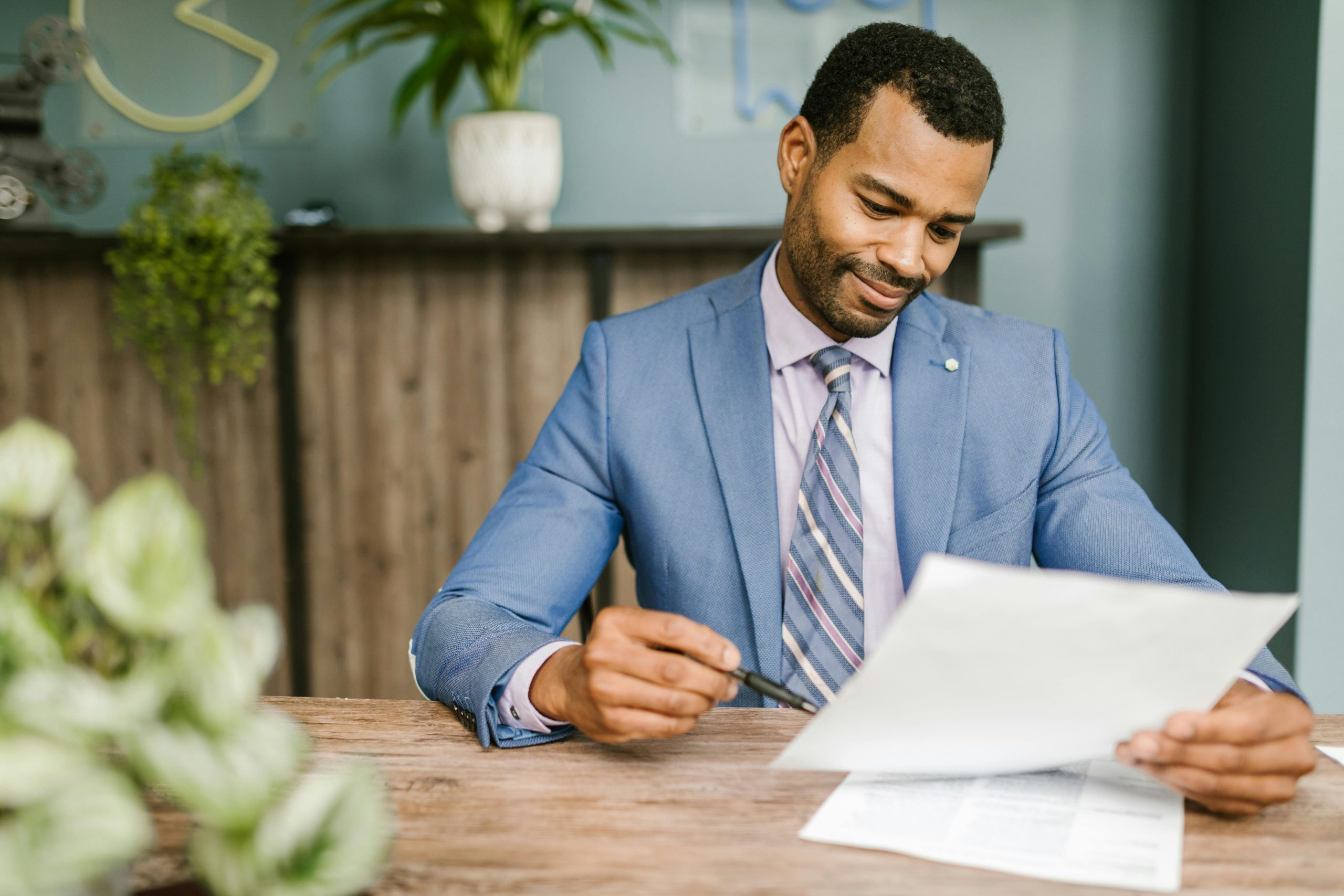 happy accountant checking the bond paper