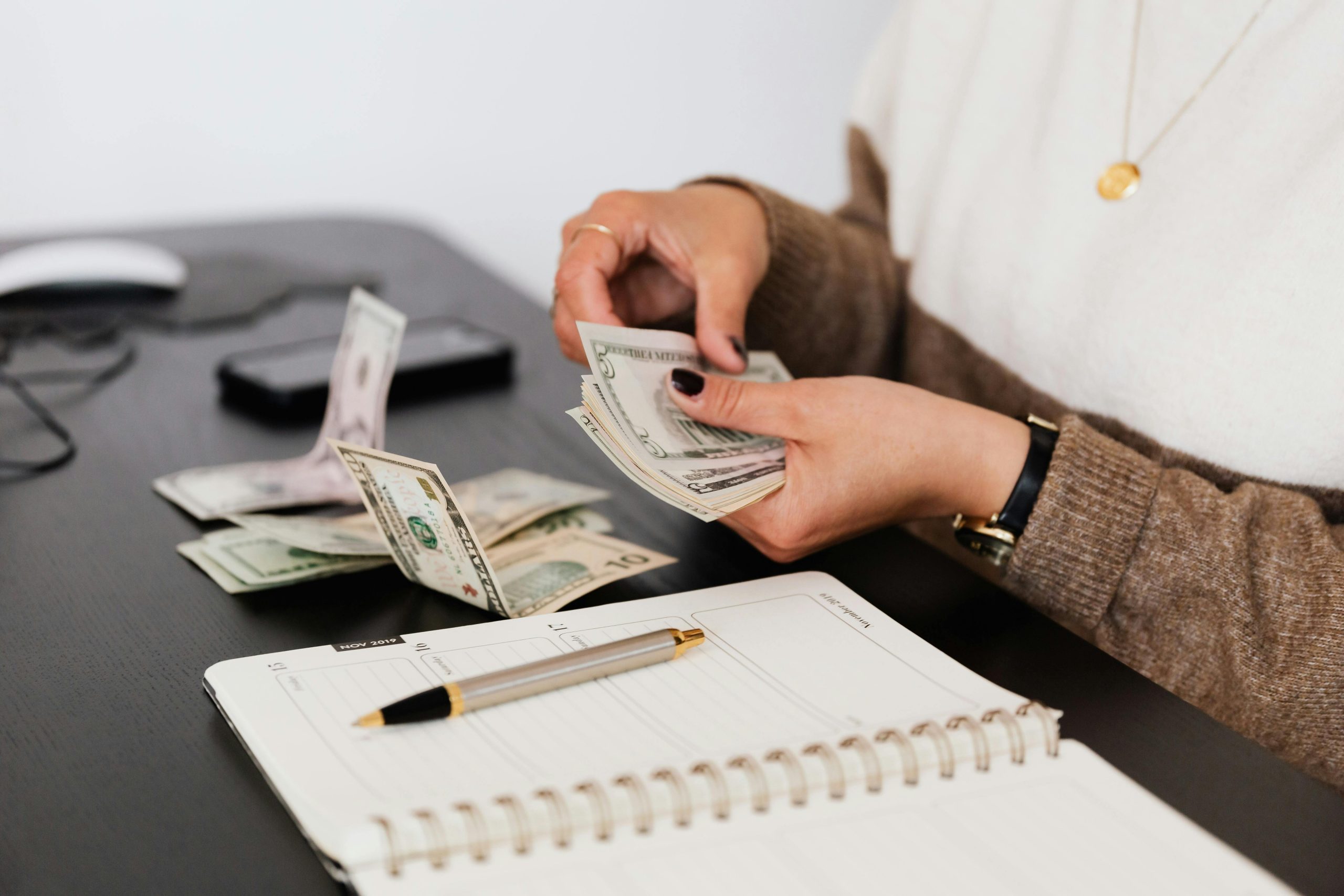 accountant counting her money