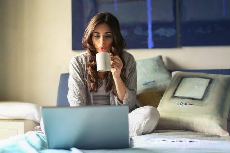 accountant working from home while having a coffee
